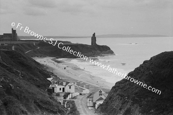 STRAND AND CLIFF SCENE WITH HOUSES